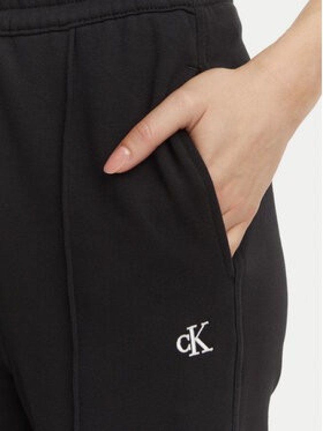 Calvin Klein Jeans Spodnie dresowe Monogram LV047H220G Czarny Flare Fit