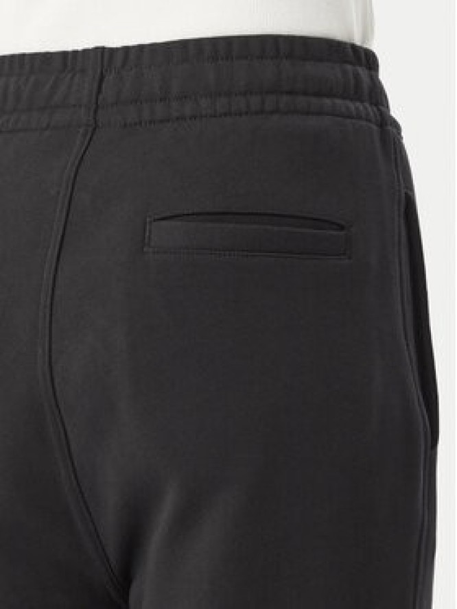 Calvin Klein Jeans Spodnie dresowe Monogram LV047H220G Czarny Flare Fit