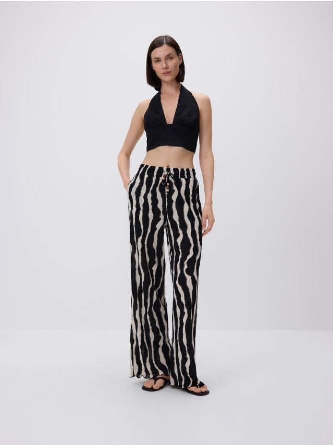 Wzorzyste spodnie z koralikami - wielobarwny