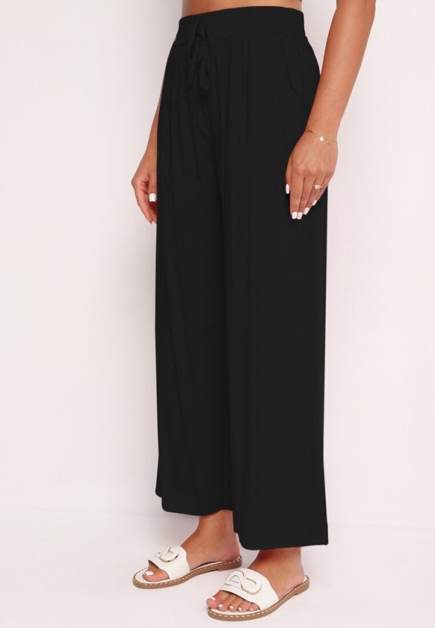 Czarne Bawełniane Szerokie Spodnie Alladynki z Wysokim Stanem i Gumką w Talii Risalles