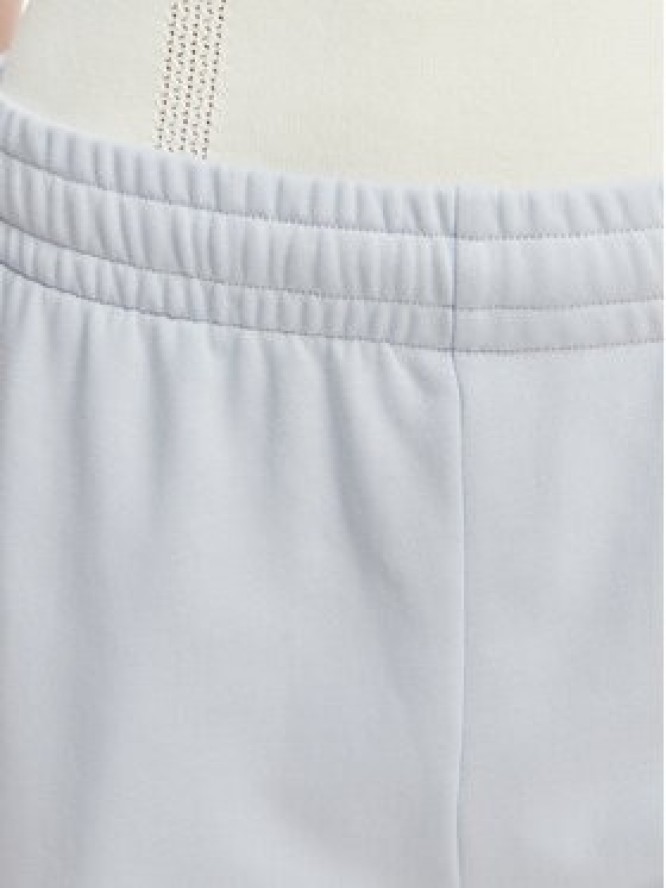 Lacoste Spodnie dresowe XF7604 Niebieski jasny Regular Fit