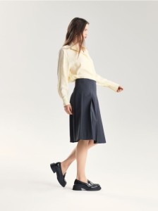 Rozkloszowana spódnica midi - zielony