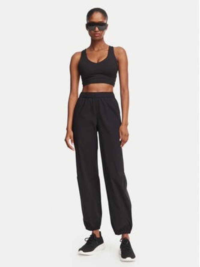 Under Armour Spodnie dresowe Unstoppable 6011400 Czarny Regular Fit