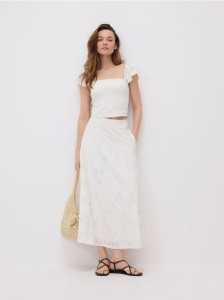 Rozkloszowana spódnica midi - złamana biel