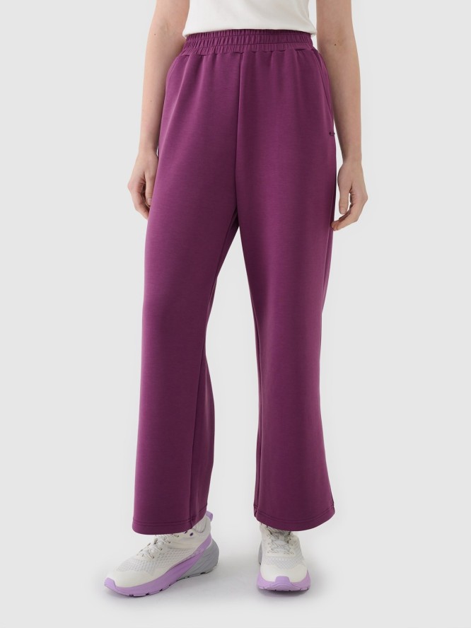4F Spodnie dresowe z modalem z szerokimi nogawkami damskie - fioletowe S