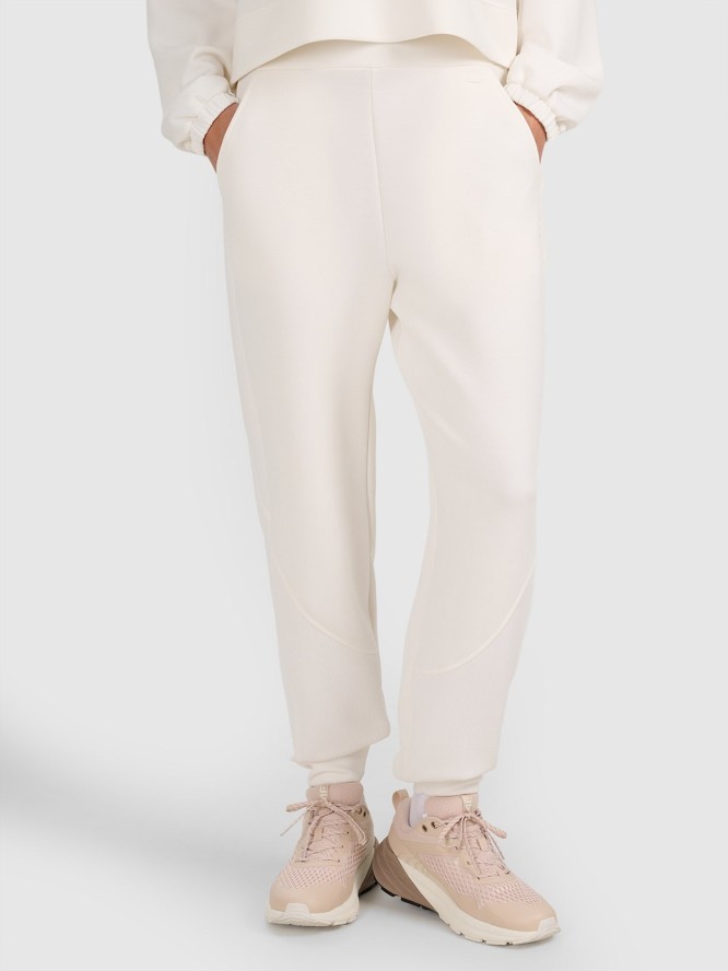 4F Spodnie dresowe joggery z modalem damskie - białe XXL