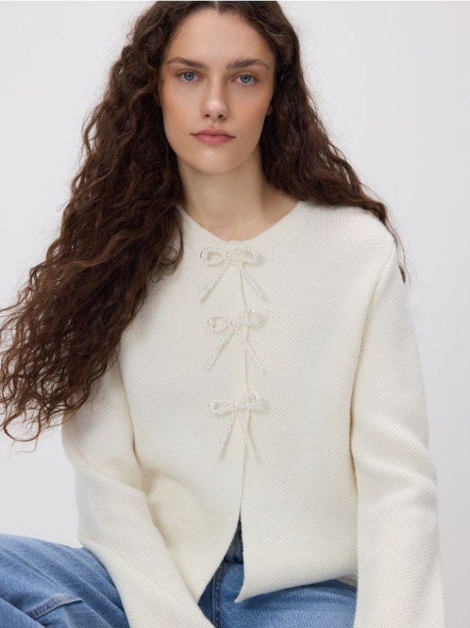 Kardigan z kokardkami - kremowy