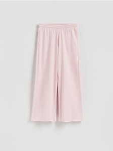 Spodnie dresowe z szerokimi nogawkami - pastelowy róż
