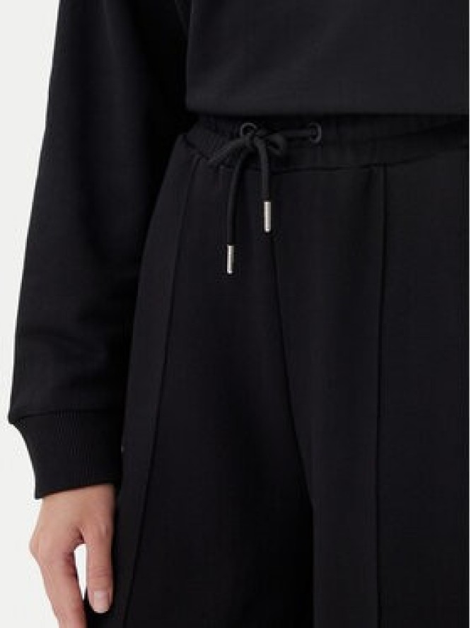 Guess Spodnie dresowe V5GB07 KCRP0 Czarny Regular Fit