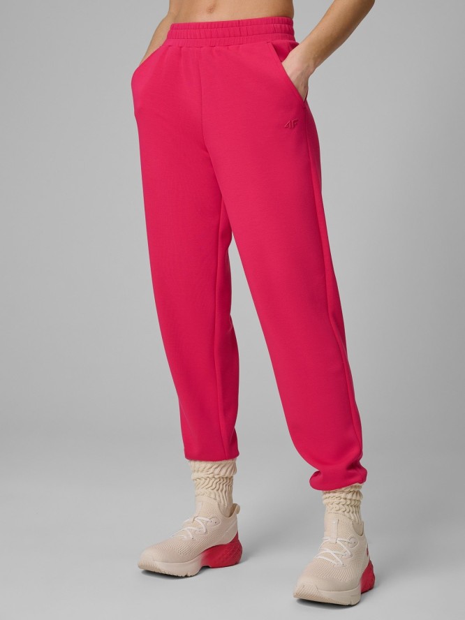 4F Spodnie dresowe joggery damskie - różowe M