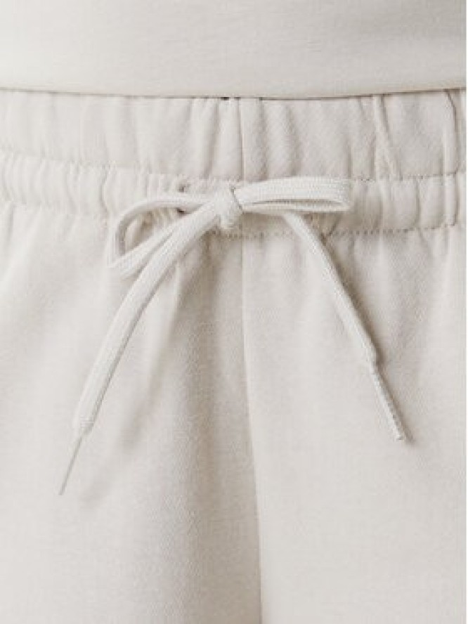 adidas Spodnie dresowe Essentials Small Logo Feel Cozy JC5922 Beżowy Regular Fit