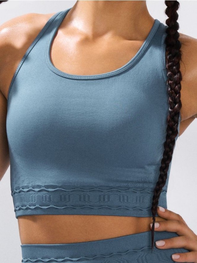 Top sportowy z ozdobnym przeszyciem w talii - turkusowy