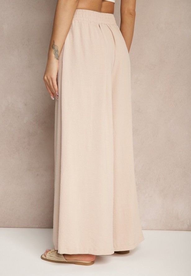 Beżowe Spodnie Palazzo o Szerokim Kroju Ozdobione Sznurkiem Ularira