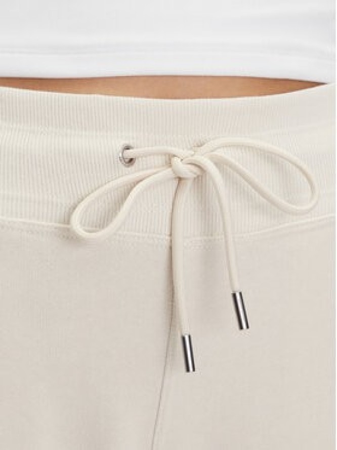 DKNY Sport Spodnie dresowe DP5P3624 Beżowy Regular Fit