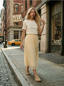 Plisowana spódnica midi z wiązaniem w pasie - żółty