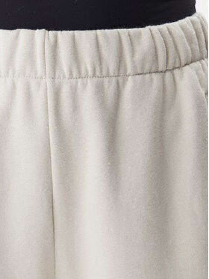 Gap Spodnie dresowe 765568-03 Beżowy Relaxed Fit