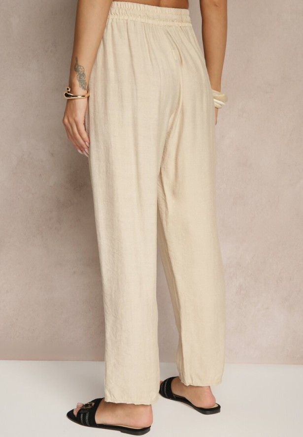 Beżowe Spodnie z Bawełną Ozdobione Wiązaniem Voreia