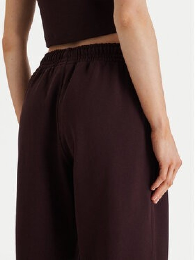 Calvin Klein Jeans Spodnie dresowe Monologo LV047B235G Brązowy Regular Fit