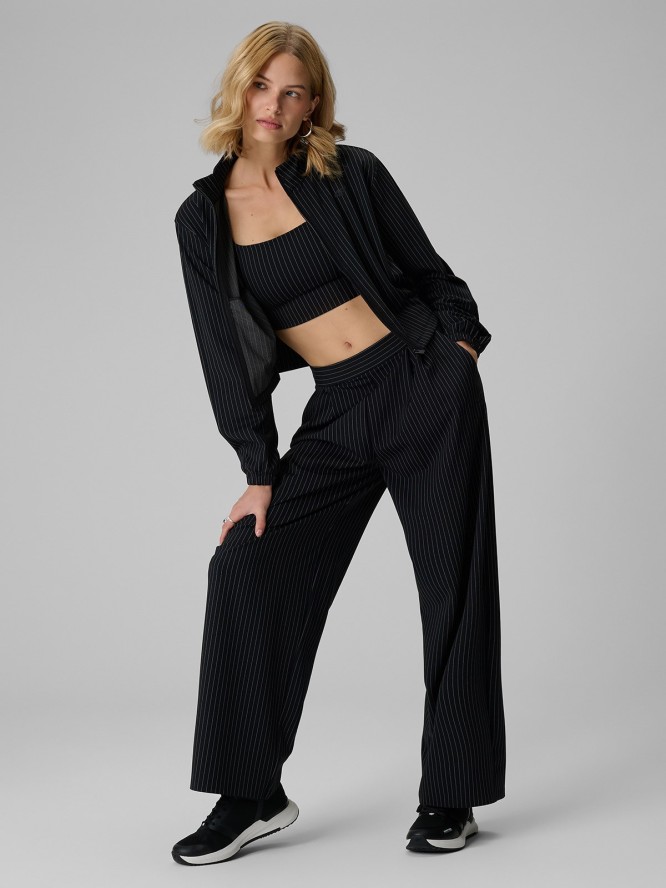4F Bluza dresowa relaxed bez kaptura damska - czarna XS
