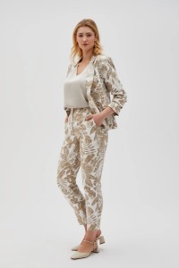 Spodnie z roślinnym wzorem beżowe