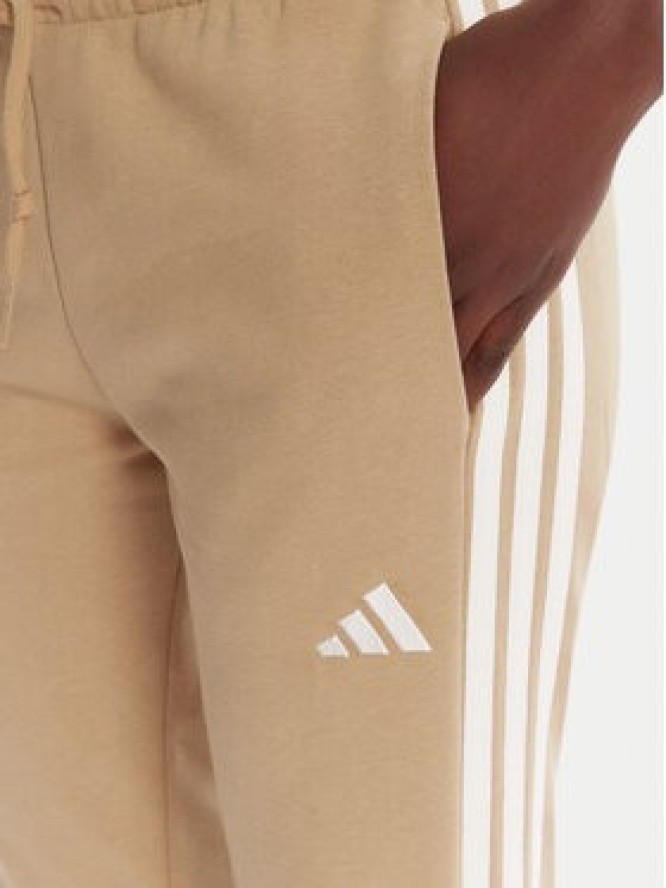 adidas Spodnie dresowe Essentials 3-Stripes JX7661 Beżowy Regular Fit