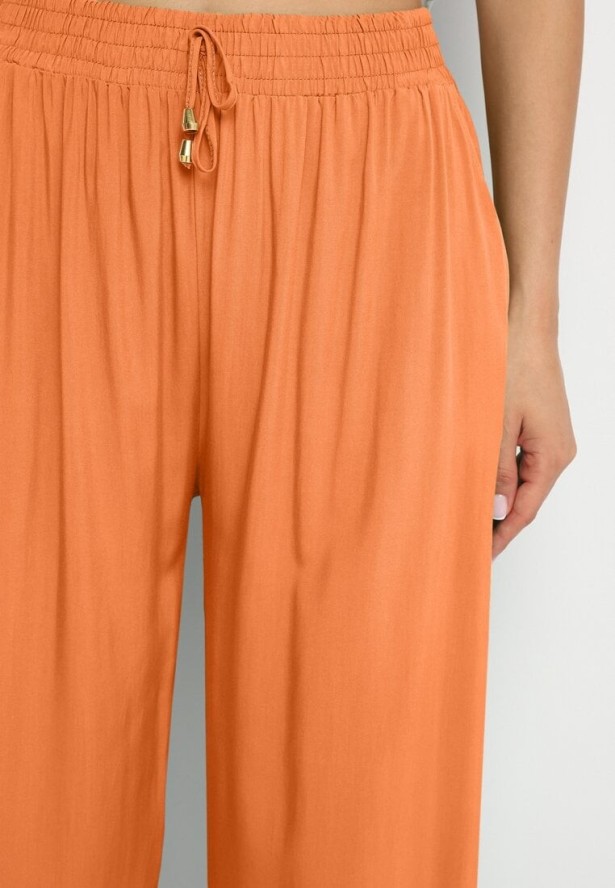 Pomarańczowe Gładkie Spodnie z Gumką w Pasie i Szerokimi Nogawkami Alathera