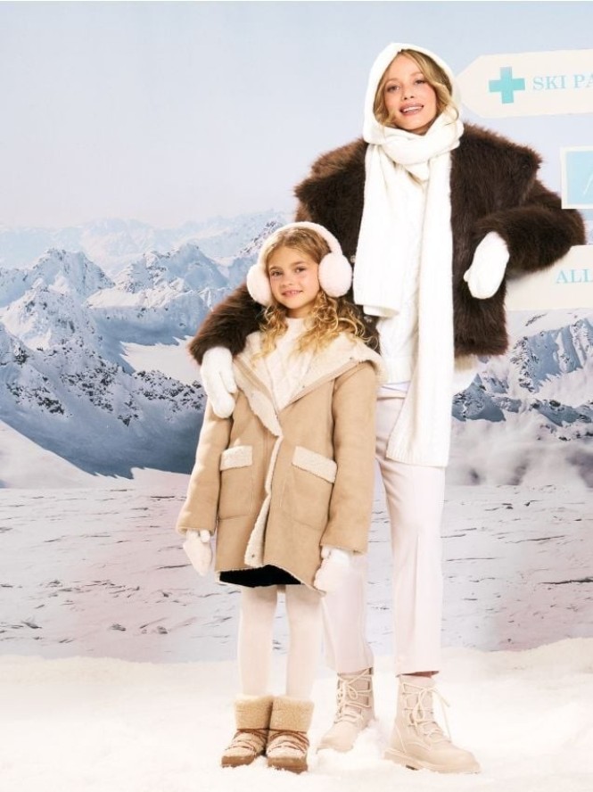 Spodnie cygaretki - kremowy