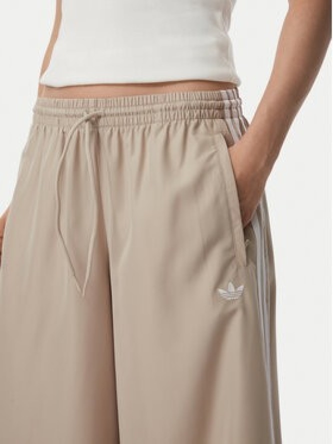 adidas Spodnie dresowe Firebrid Adilenium Track KT0019 Beżowy Relaxed Fit