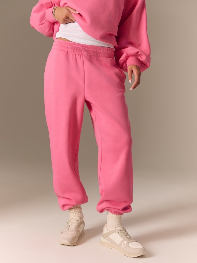 4F Spodnie dresowe joggery damskie - różowe XL