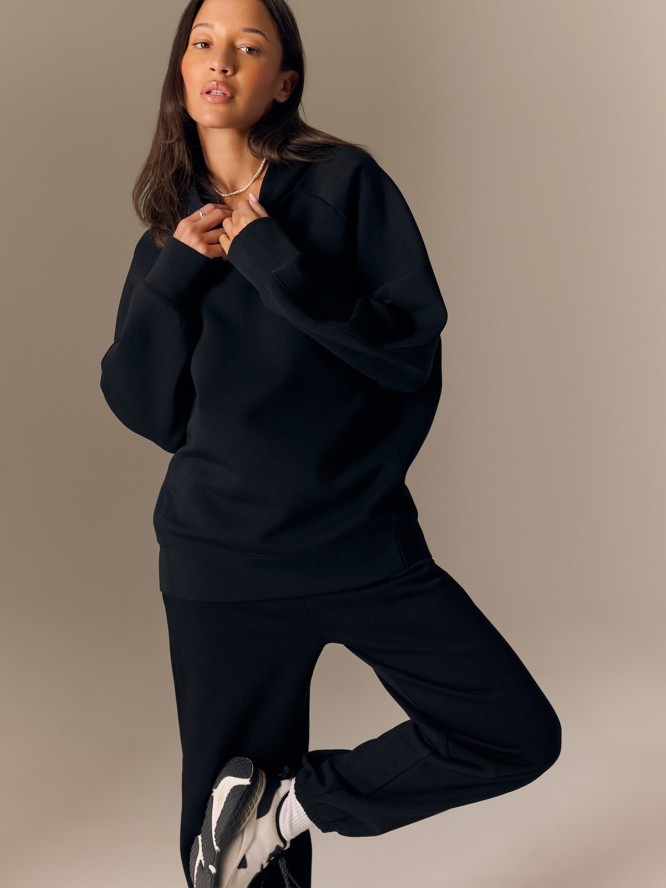 4F Bluza dresowa loose z kapturem damska - czarna S