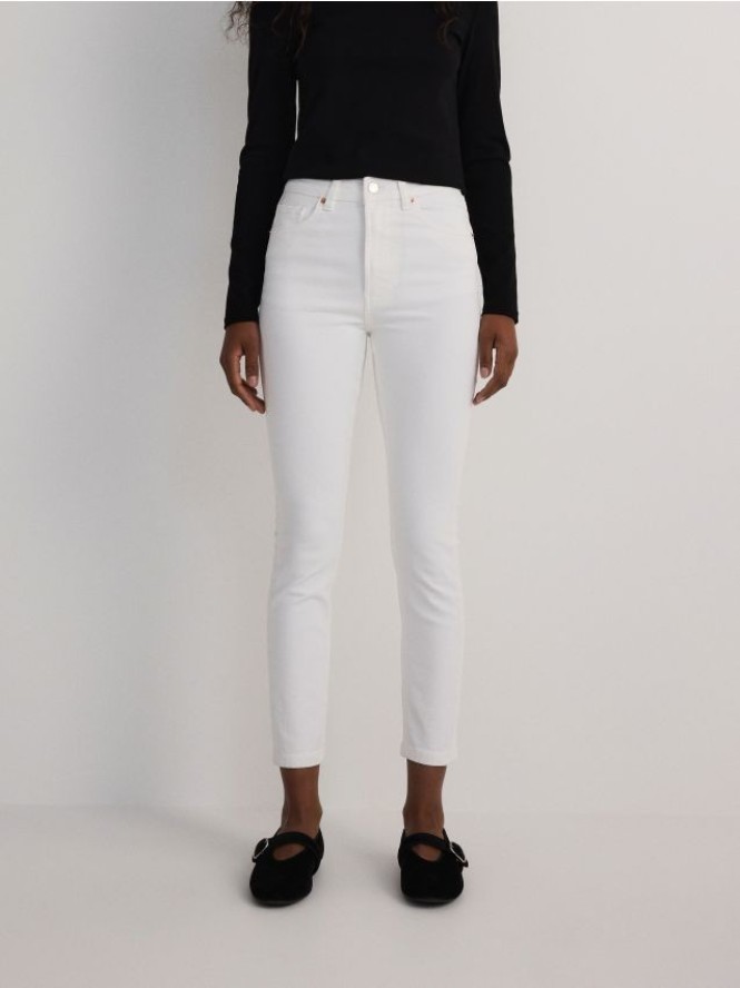 Jeansy slim fit mid rise - biały