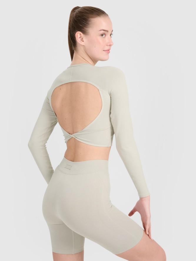 4F Longsleeve treningowy crop-top z wycięciem na plecach damski - beżowy M/L