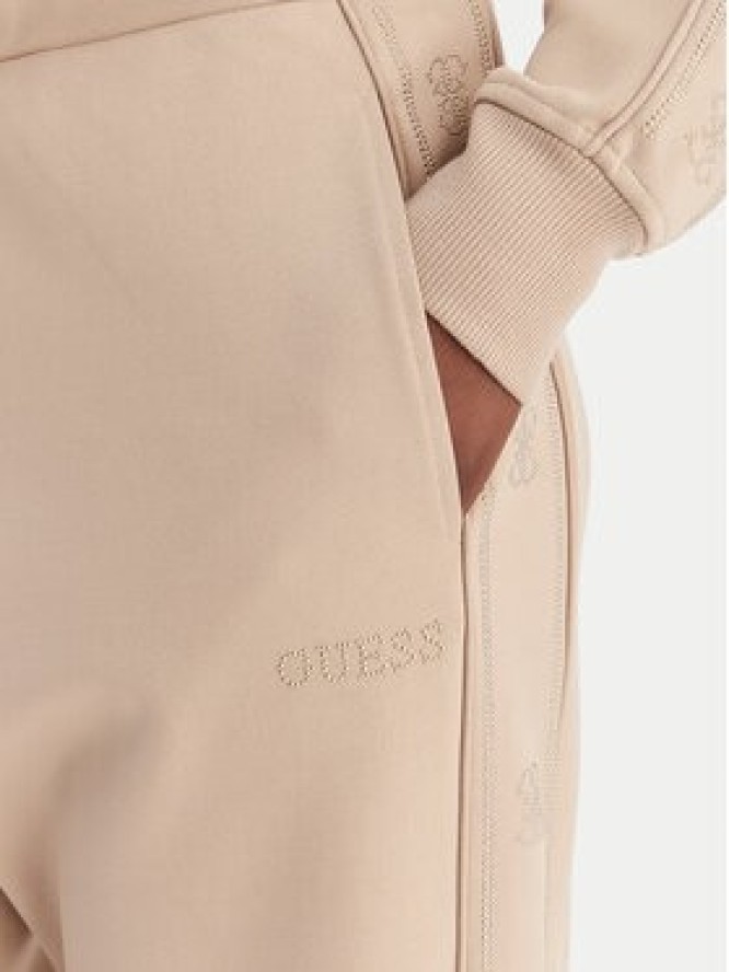 Guess Spodnie dresowe V5BB23 KCX22 Beżowy Regular Fit