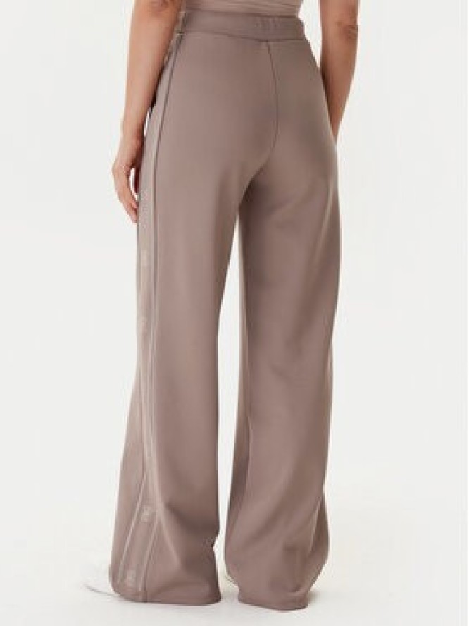 Guess Spodnie dresowe V5BB12 KCX22 Beżowy Wide Leg