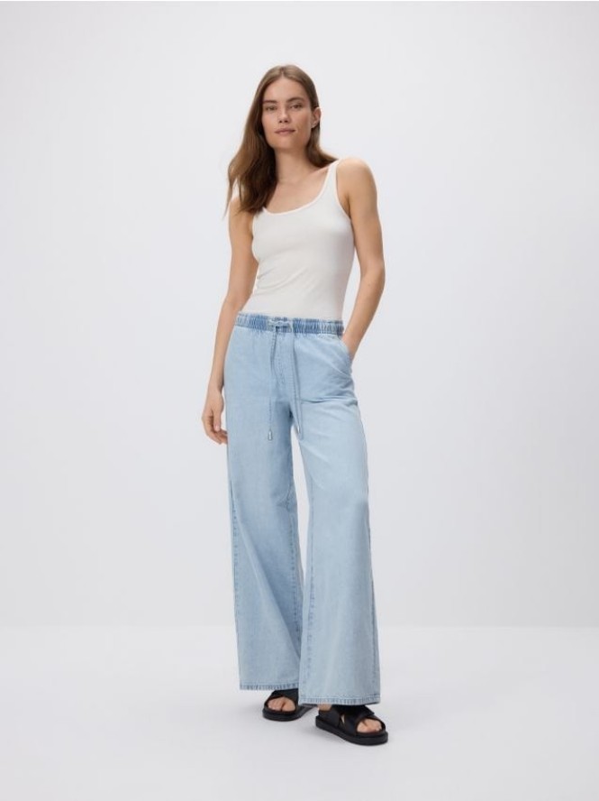 Jeansy wide leg ze sznurkiem - niebieski