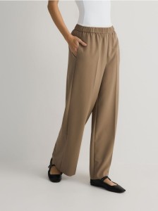 Szerokie spodnie z kontrastowym pasem - brązowy