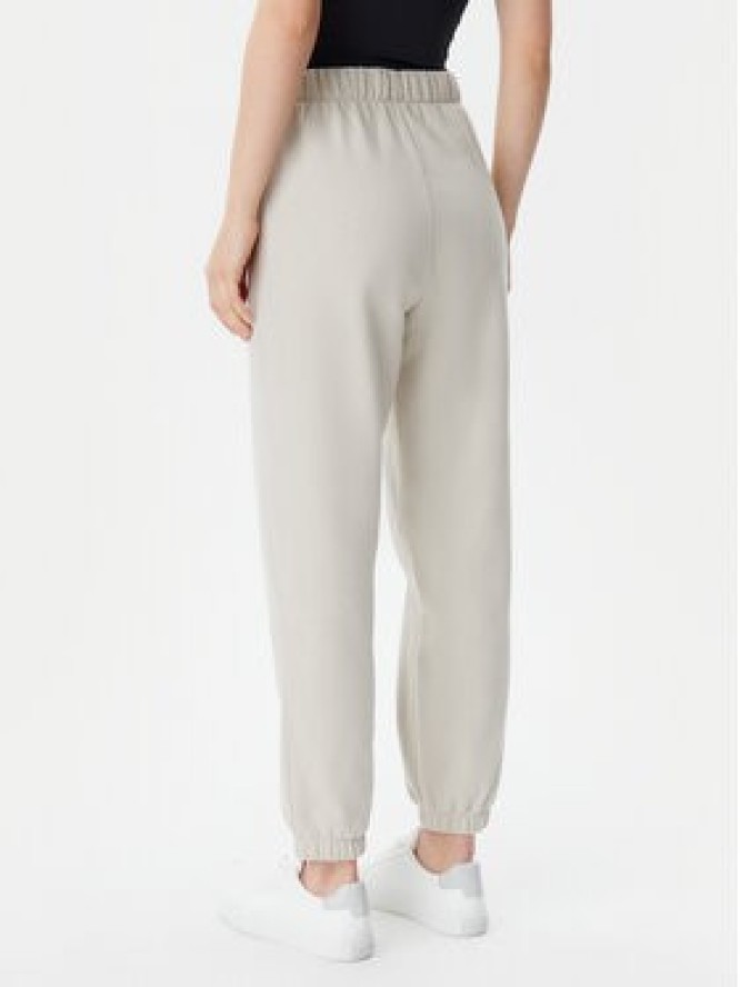 Gap Spodnie dresowe 765568-03 Beżowy Relaxed Fit