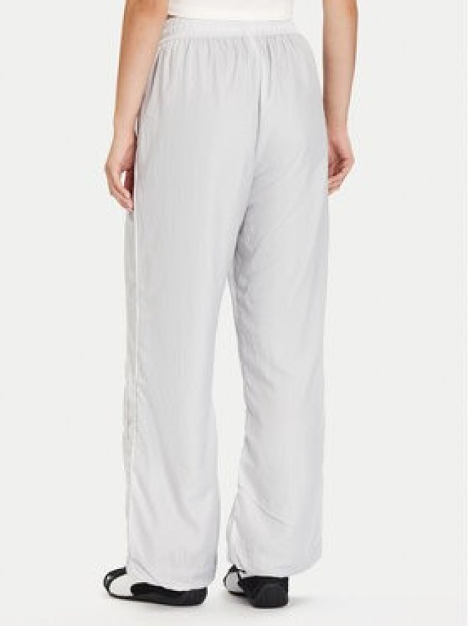 Puma Spodnie dresowe PUMA X ROSÉ T7 633796 32 Srebrny Relaxed Fit