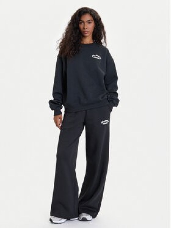 New Balance Spodnie dresowe WP53902 Czarny Relaxed Fit