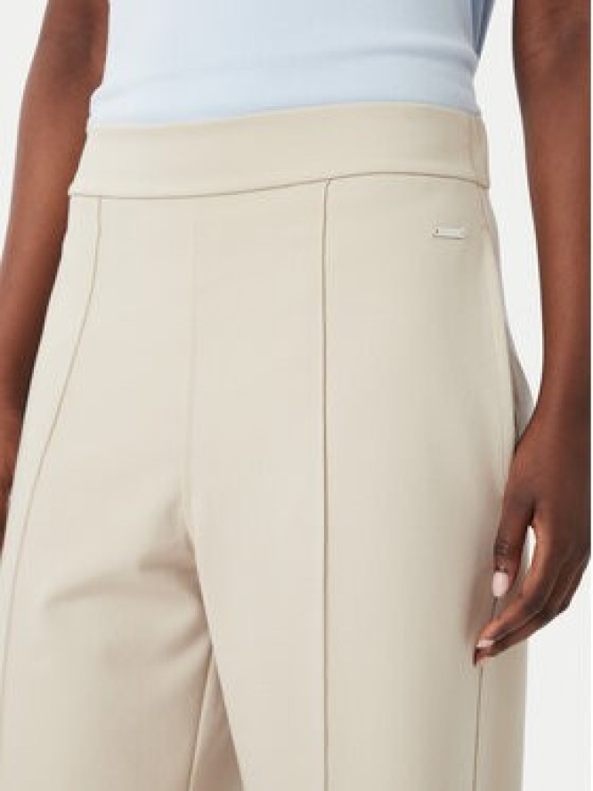 Calvin Klein Spodnie materiałowe LV044G210G Beżowy Relaxed Fit
