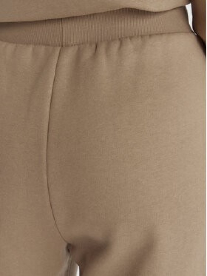 Guess Spodnie dresowe V6RB15 K9V31 Beżowy Regular Fit