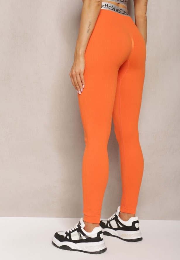 Pomarańczowe Sportowe Legginsy Elastyczne z Ozdobną Szeroką Gumą w Pasie Larnode