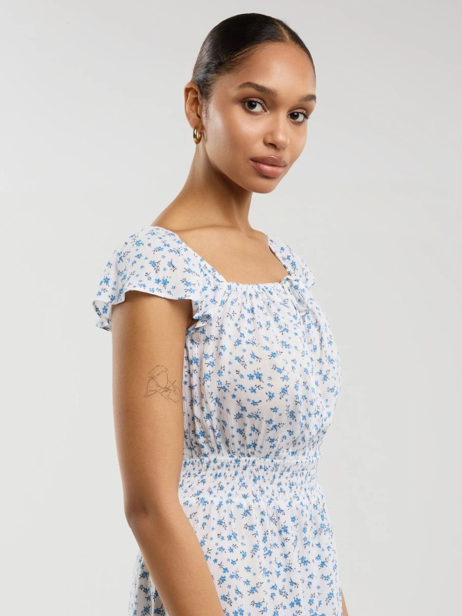 Sukienka damska midi z wiskozy z motywem kwiatowym biała Lopa 100