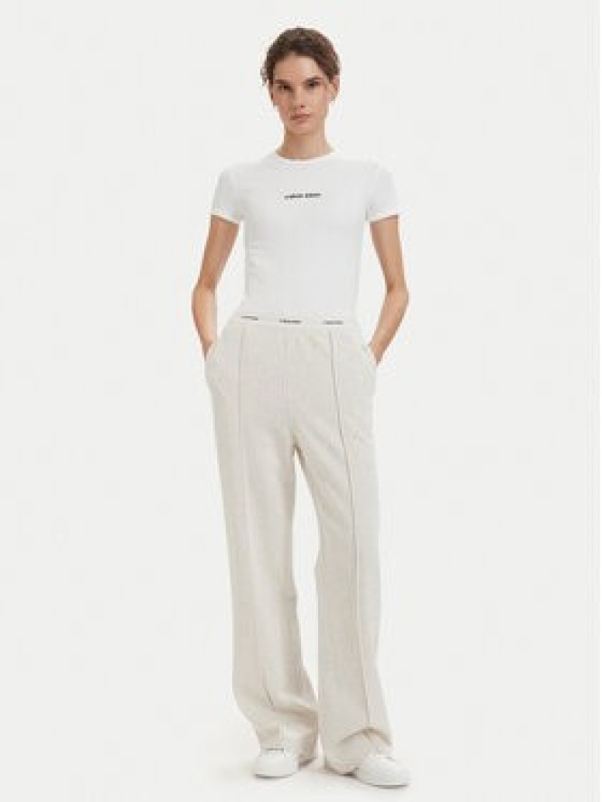 Calvin Klein Jeans Spodnie dresowe LV047G253G Kremowy Relaxed Fit