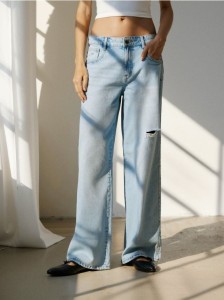 Jeansy baggy z przetarciami - niebieski