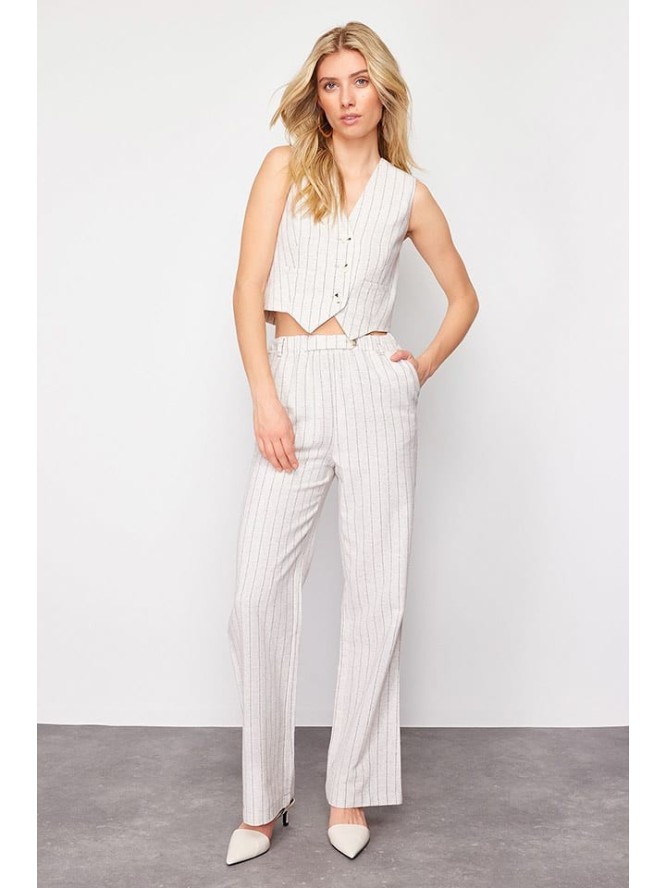 trendyol Spodnie w kolorze beżowym rozmiar: 36