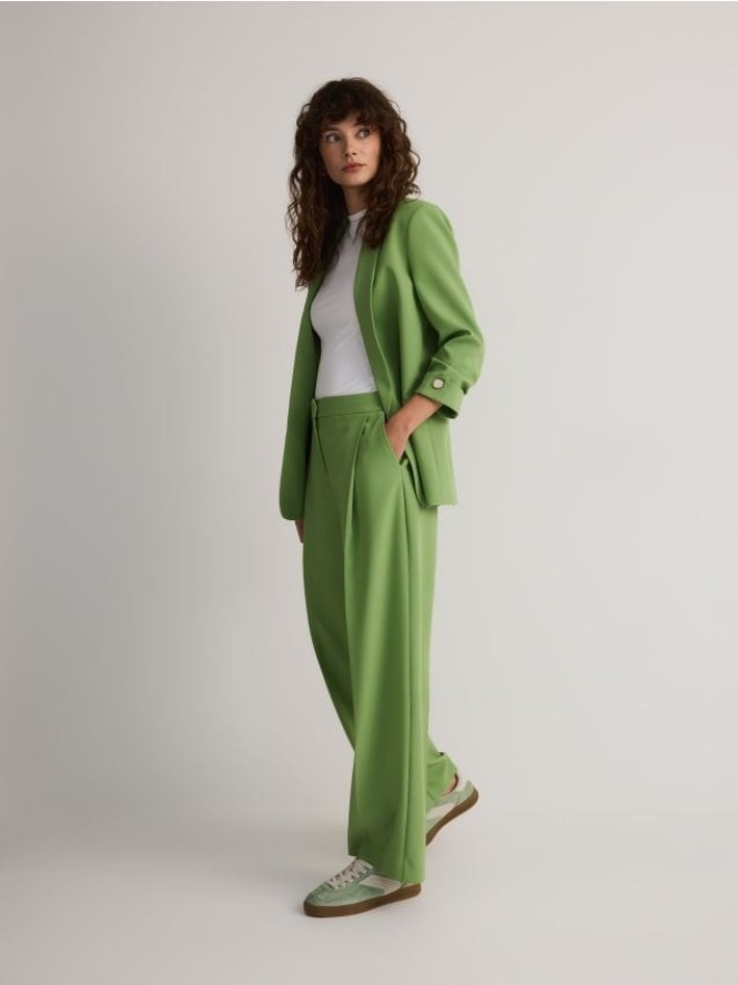Szerokie spodnie z kantem - jasnozielony