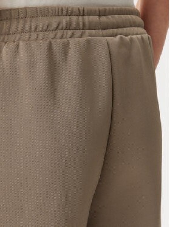 Puma Spodnie dresowe T7 Always On 629797 Brązowy Straight Fit