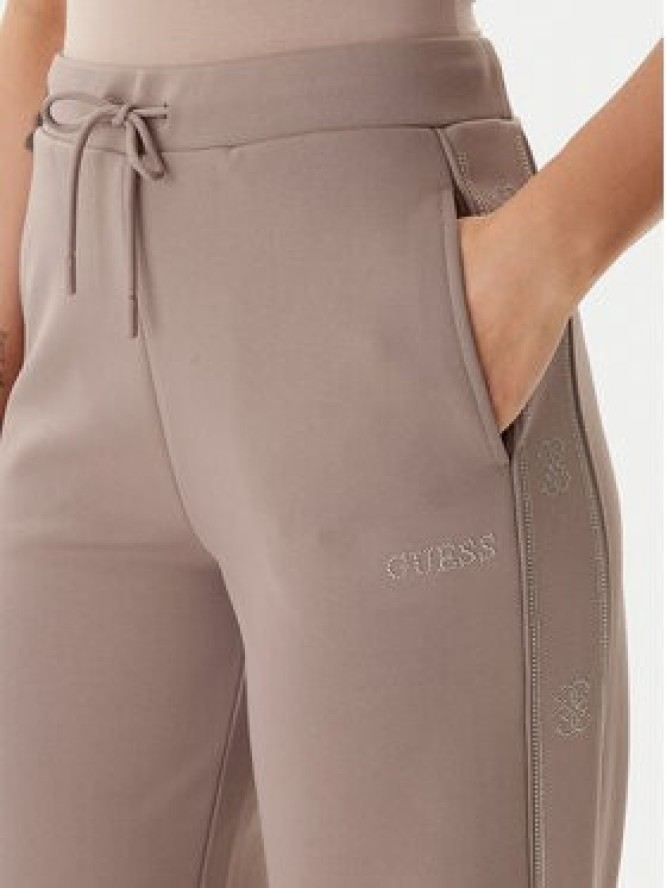 Guess Spodnie dresowe V5BB12 KCX22 Beżowy Wide Leg