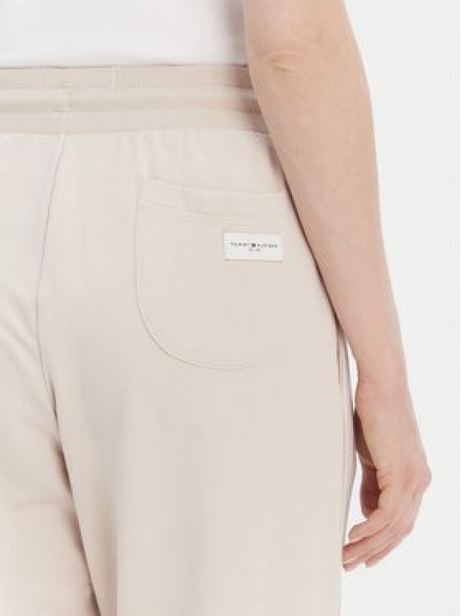 Tommy Hilfiger Spodnie dresowe UW0UW04771 Beżowy Relaxed Fit
